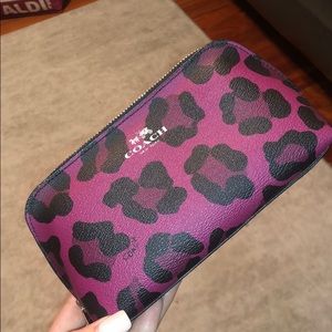 Coach ocelot leather cosmetic pouch